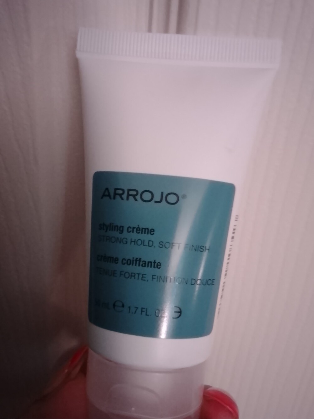 Arrojo Styling Crème in a 50ml (1.7 fl. oz.) travel-sized tube